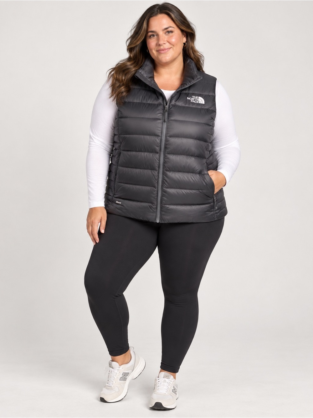 The North Face women’s XL 550 Black Quilted Down Vest